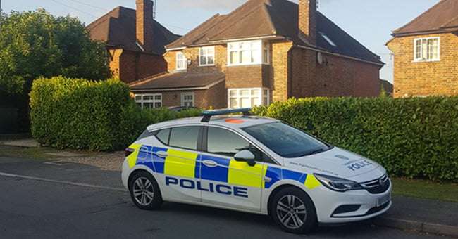 Police-car-outside-house